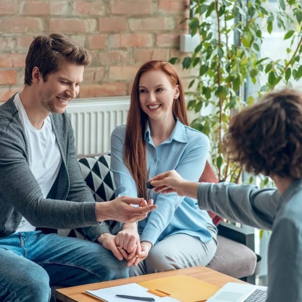 broker-giving-buyer-real-estate-key-1-1.jpg